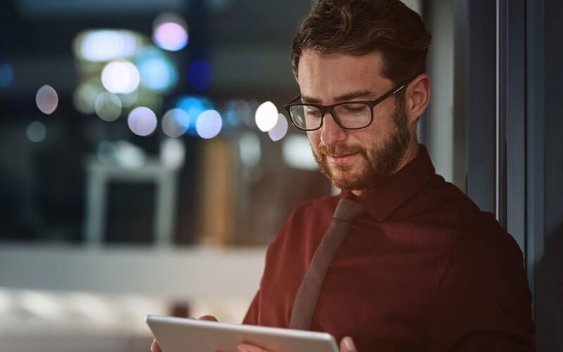 Developer working on computer in office