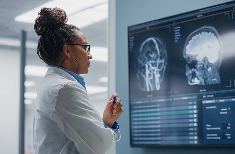 Doctor looking at scans